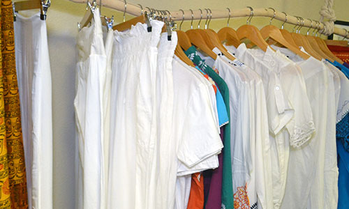 Yoga and meditation session in Las Vegas with practitioners wearing white clothing.