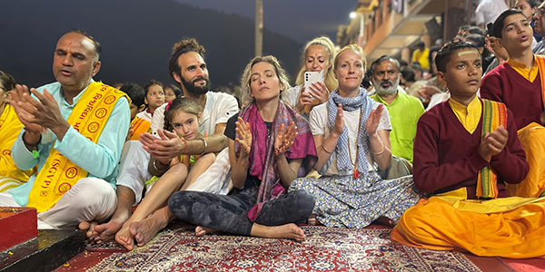 India Meditation – Peaceful meditation practice in India, surrounded by serene landscapes to enhance spiritual growth.