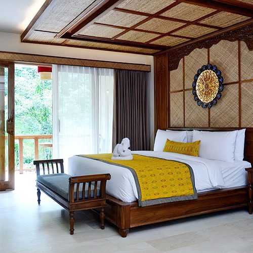 Comfortable room at RYK Yoga retreat – Serene accommodations for relaxation and rejuvenation.